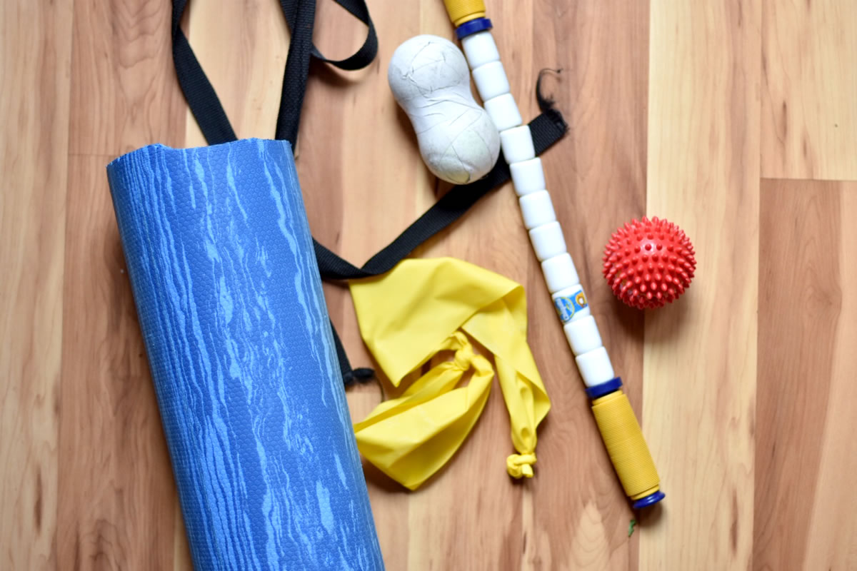 Recovery Kit including foam roller, strap, lacrosse balls stretchy bands and stick. [Photo] Erika Flowers